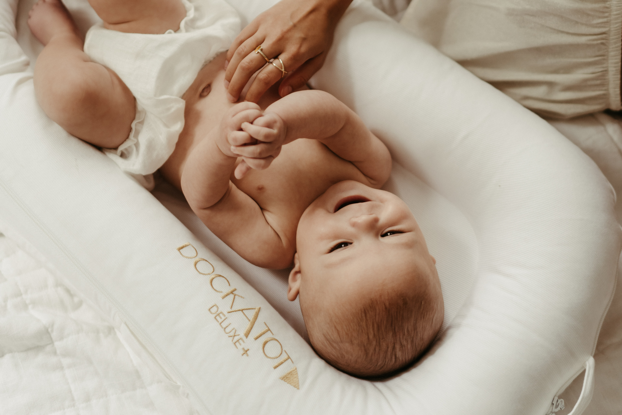 Is A DockATot Baby Nest Worth It? New Parents Tell Us Their Answers
