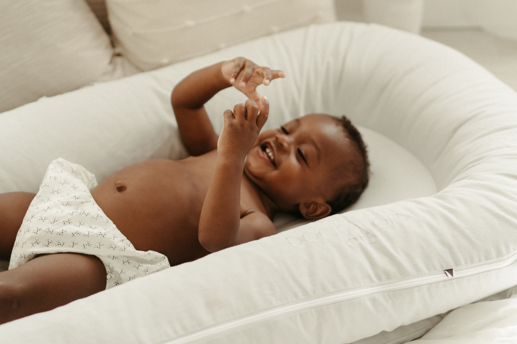 Tips on Easing the Transition from Cot to Big Bed with DockATot Grand Baby Bed Lounger